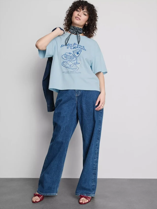 Camiseta gráfica de algodão com corte largo