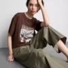 Camiseta gráfica de algodão com corte largo