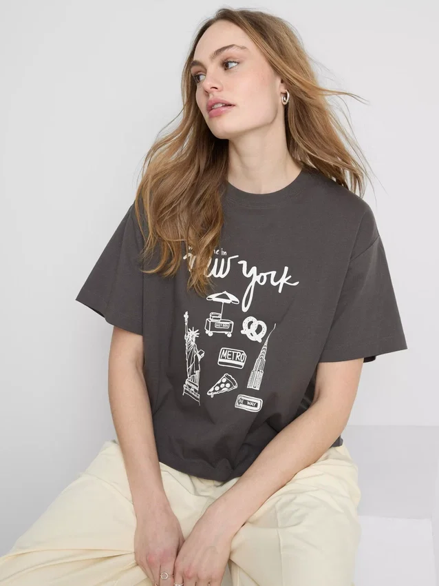 Camiseta gráfica de algodão com corte largo