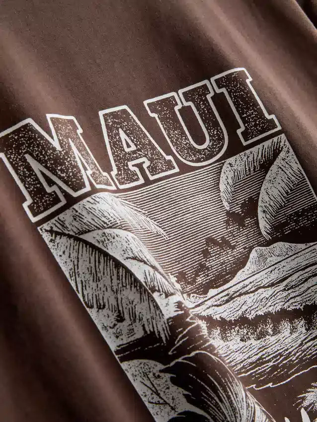 Camiseta gráfica de algodão com corte largo