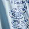 Camiseta gráfica de algodão com corte largo