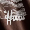 Camiseta gráfica de algodão com corte largo