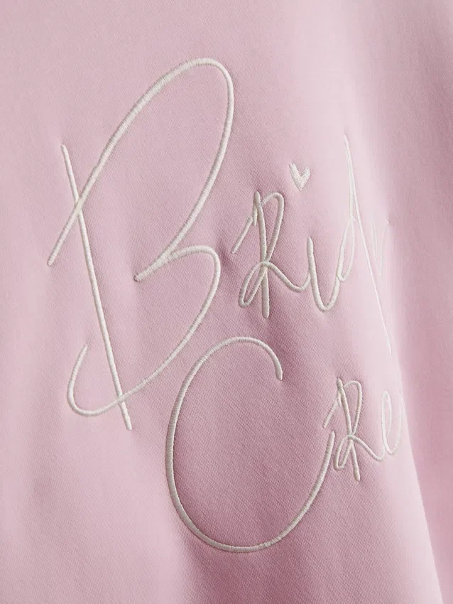 Camisola com slogan para a comitiva da noiva