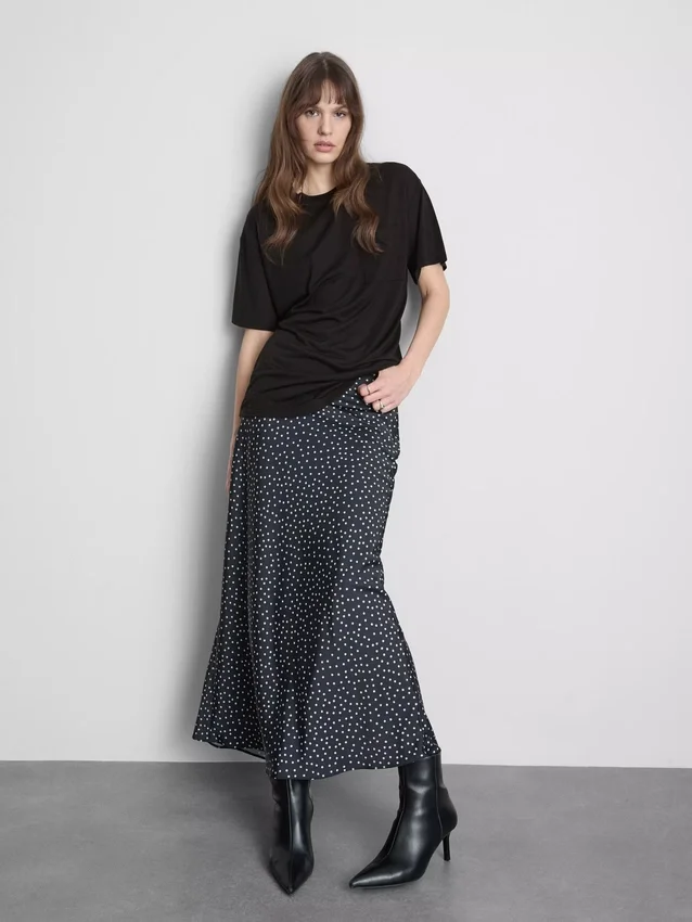Camisola comprida com bolso de remendo