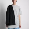 Camisola comprida com bolso de remendo