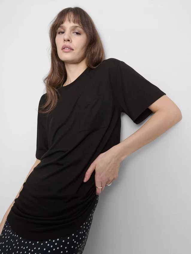 Camisola comprida com bolso de remendo