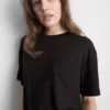 Camisola comprida com bolso de remendo