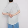 Camisola comprida com bolso de remendo