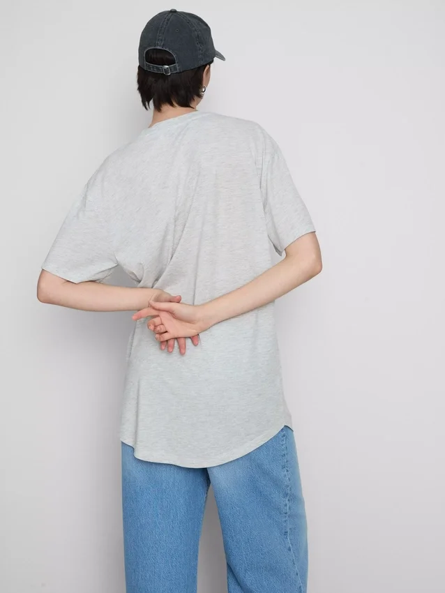Camisola comprida com bolso de remendo