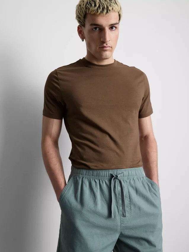 Camisola de corte justo e elástica