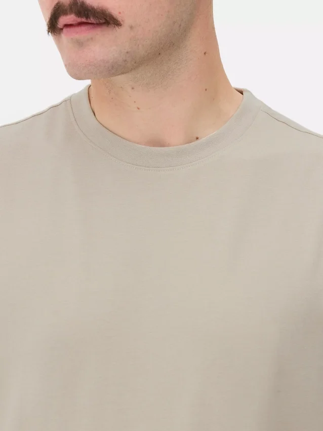 Camisola de corte justo e elástica