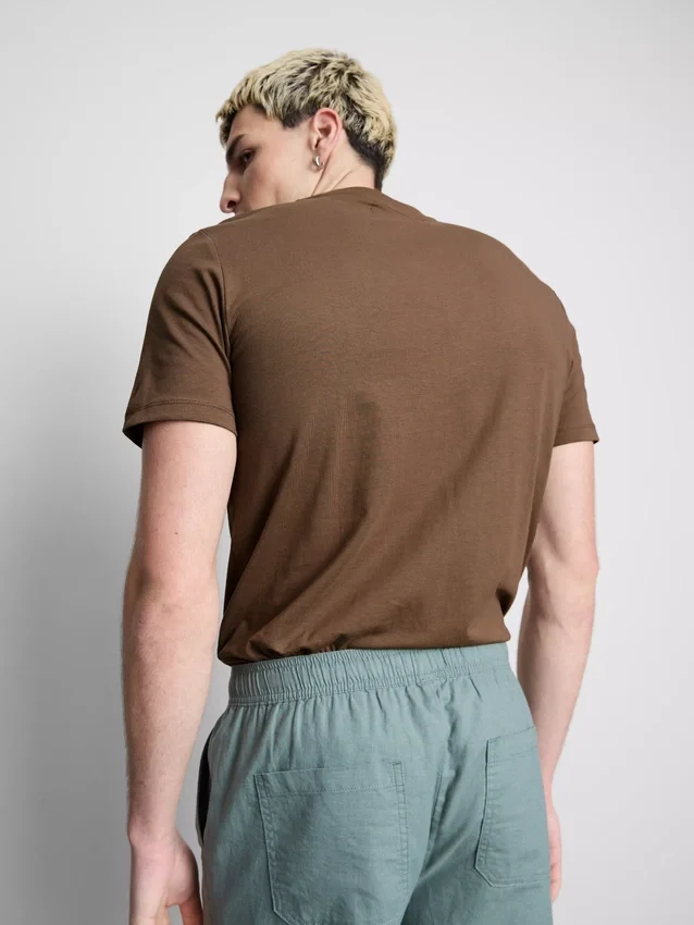 Camisola de corte justo e elástica