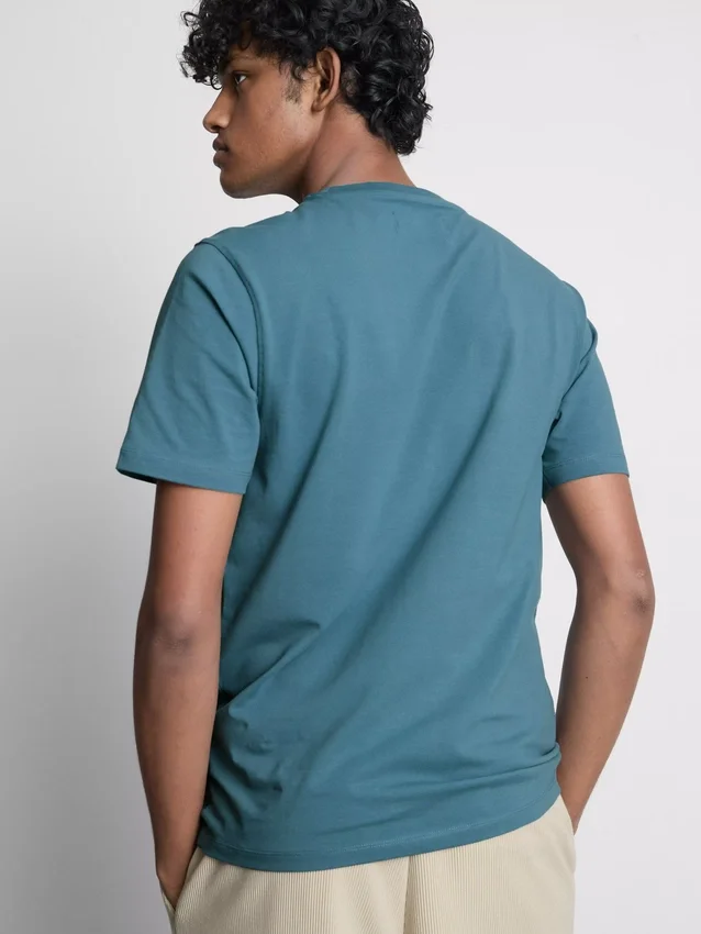 Camisola de corte justo e elástica