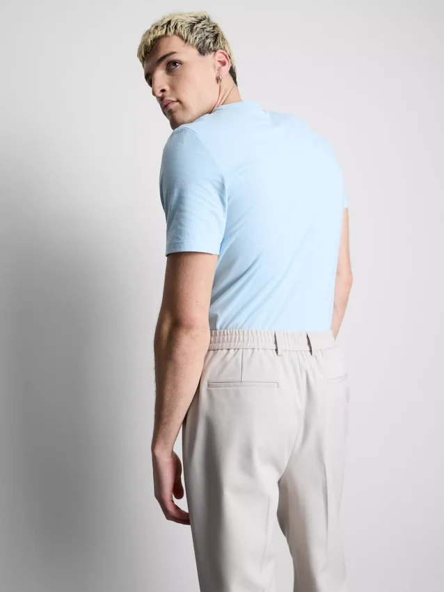 Camisola de corte justo e elástica