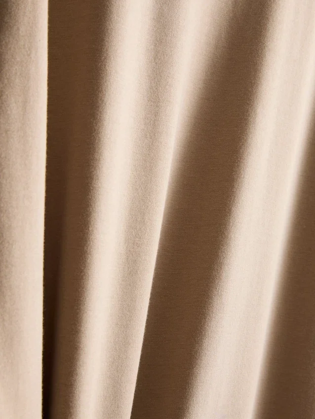 Camisola de corte justo e elástica