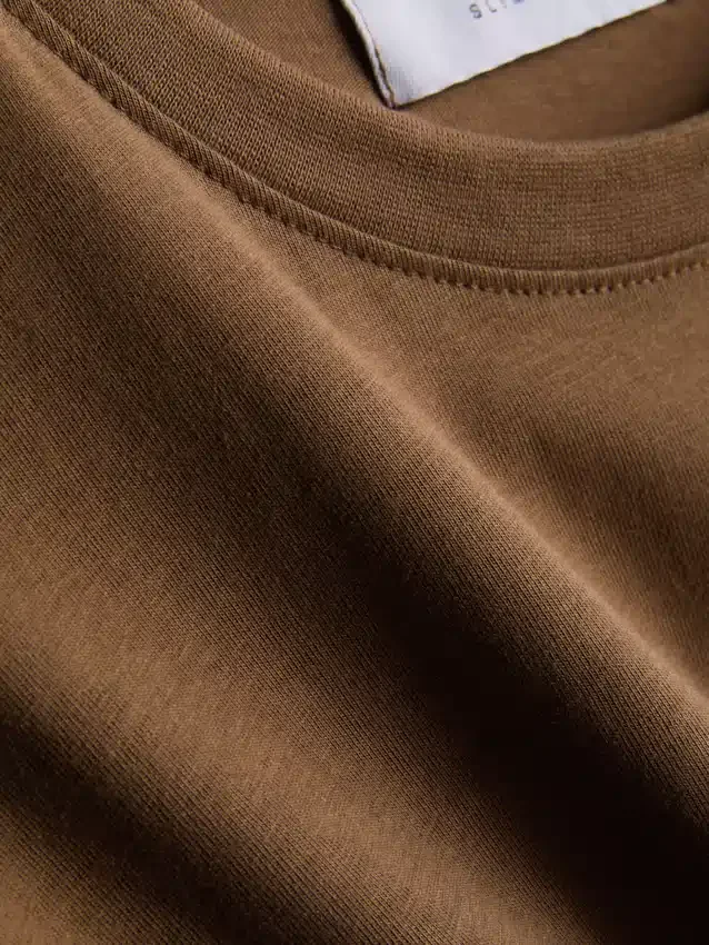 Camisola de corte justo e elástica