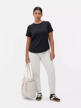 Camisola de desempenho com bainha curva