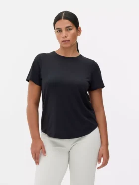 Camisola de desempenho com bainha curva