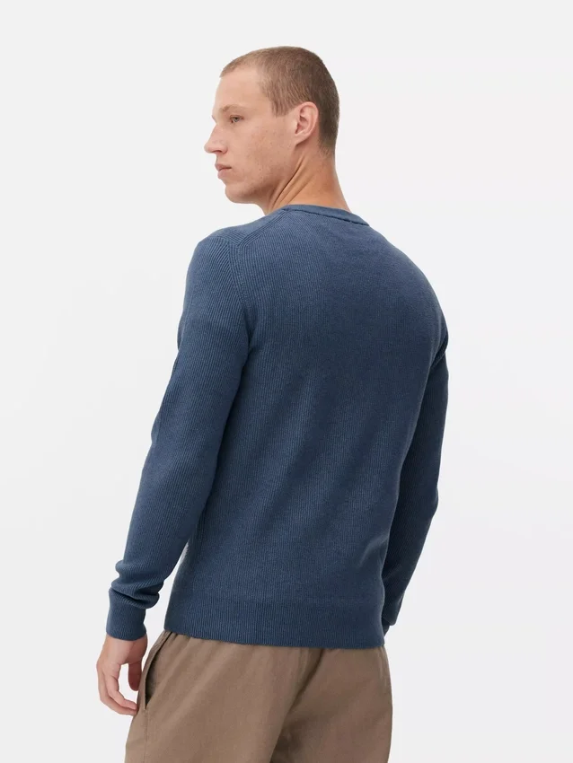 Camisola de gola redonda com canelado