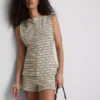 Camisola de malha às riscas com botões da Paula Echevarría
