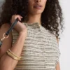 Camisola de malha às riscas com botões da Paula Echevarría