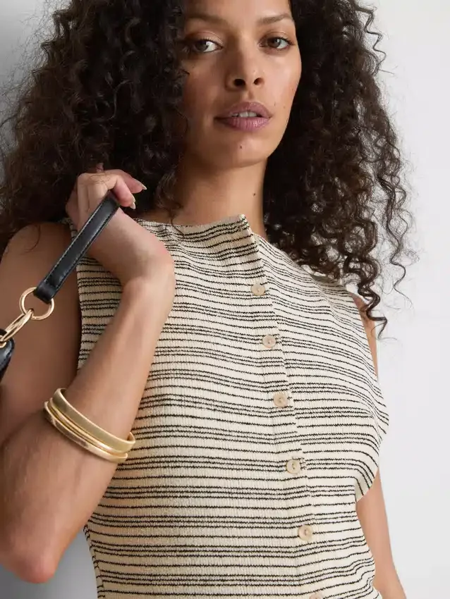 Camisola de malha às riscas com botões da Paula Echevarría