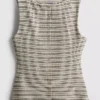 Camisola de malha às riscas com botões da Paula Echevarría