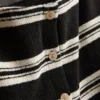 Camisola de malha às riscas com botões da Paula Echevarría