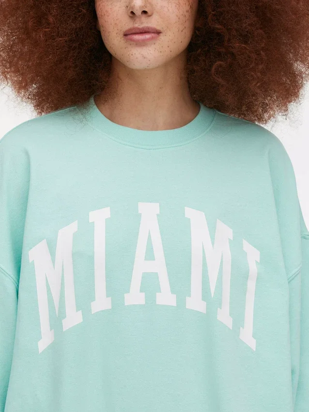 Camisola oversized com a inscrição «Miami»