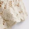 Camisola sem mangas assimétrica em croché