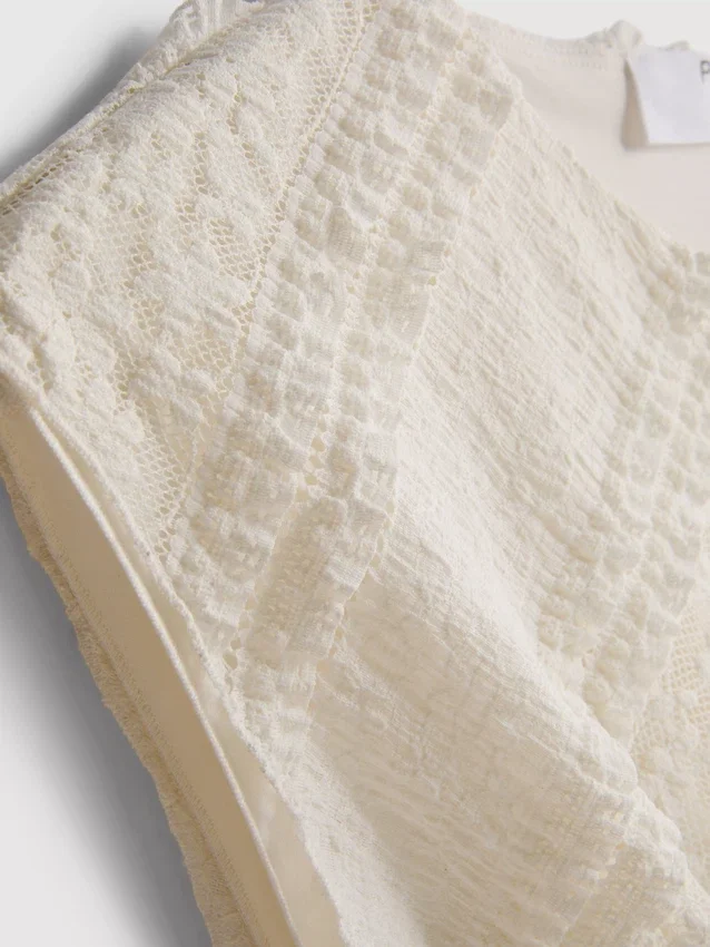 Camisola sem mangas assimétrica em renda