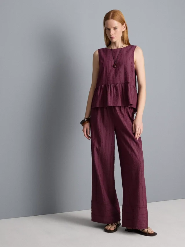 Camisola sem mangas com bainha peplum às riscas