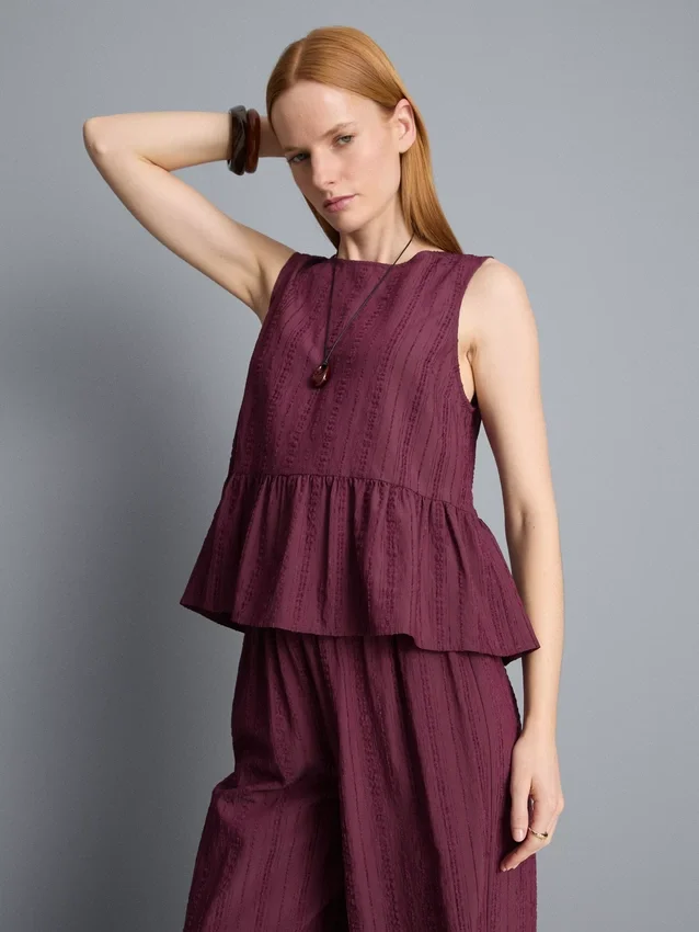 Camisola sem mangas com bainha peplum às riscas