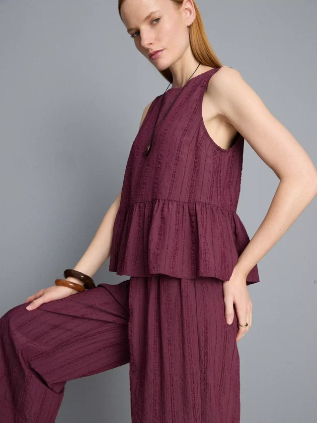 Camisola sem mangas com bainha peplum às riscas