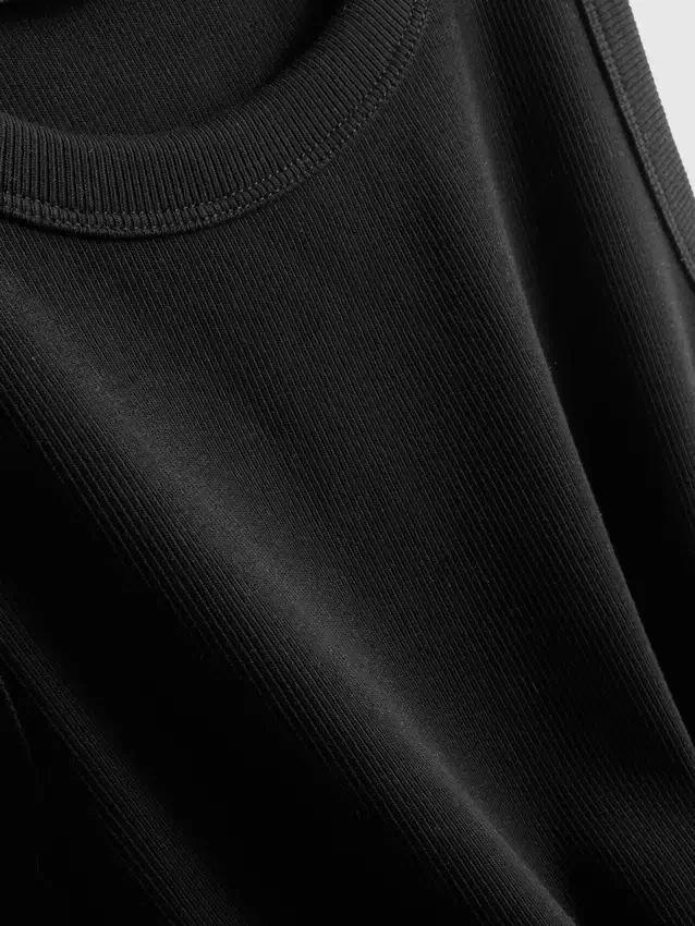 Camisola sem mangas com costas em forma de «racerback» e canelado, rica em algodão