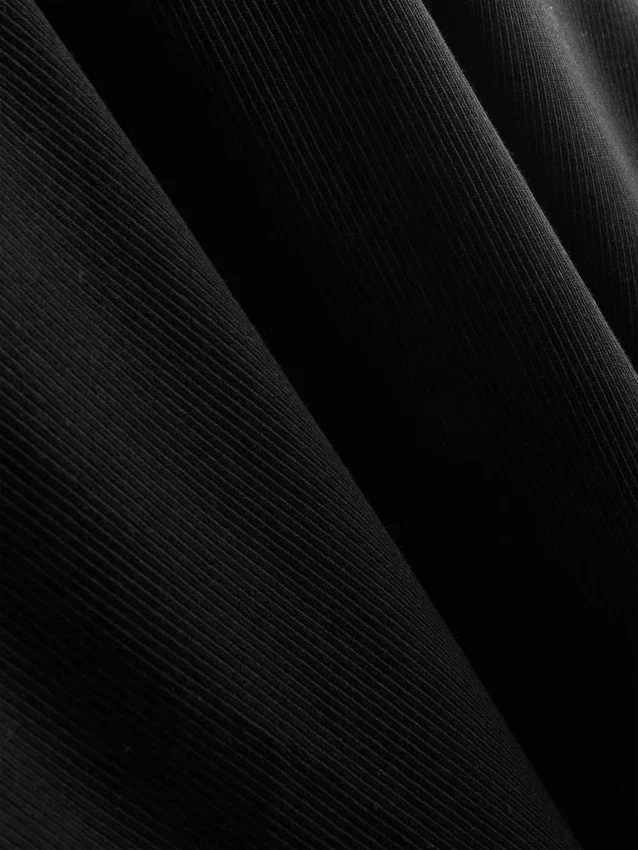 Camisola sem mangas com costas em forma de «racerback» e canelado, rica em algodão
