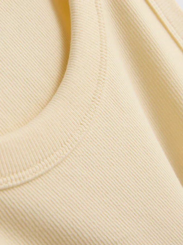 Camisola sem mangas com costas em forma de «racerback» em tecido canelado com elevada proporção de algodão