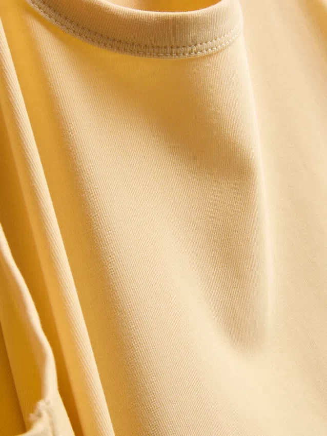 Camisola sem mangas com decote redondo e costas em estilo «racerback»
