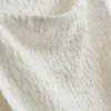 Camisola sem mangas com franzido e efeito enrugado da Paula Echevarría