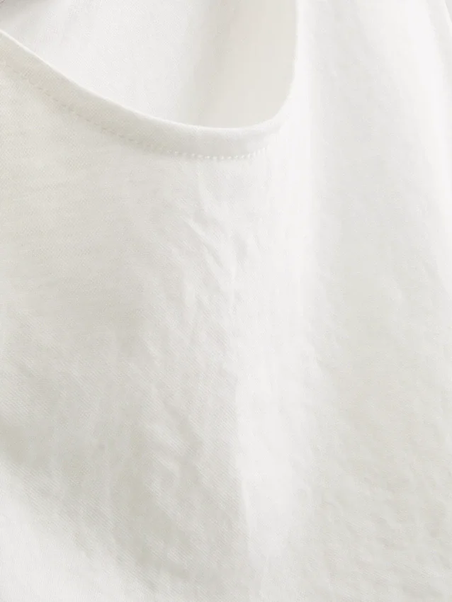 Camisola sem mangas com laço lateral texturado