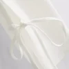 Camisola sem mangas com laço lateral texturado