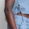 Camisola sem mangas de ganga de algodão com laço lateral