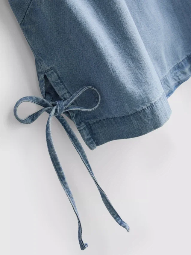 Camisola sem mangas de ganga de algodão com laço lateral