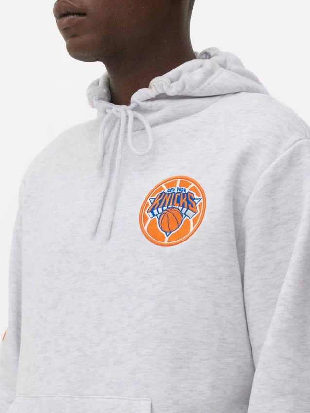 Casaco com capuz e cordão da NBA New York Knicks