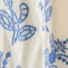 Colete de algodão com bordados florais