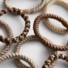 Conjunto de 10 elásticos de cabelo trançados