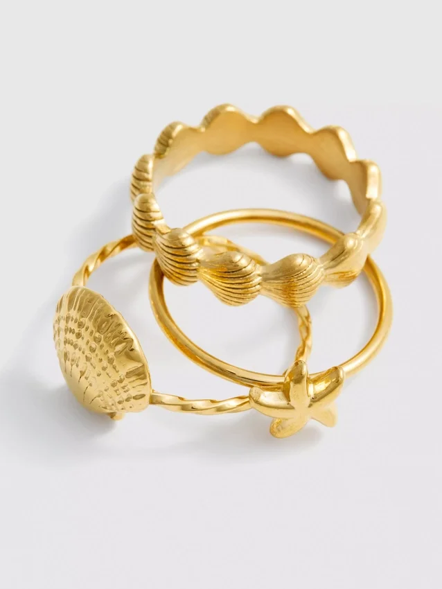 Conjunto de 3 anéis à prova de água com conchas