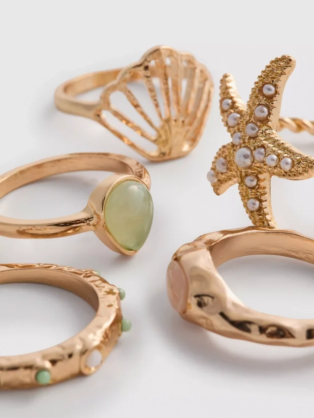 Conjunto de 5 anéis com motivos náuticos