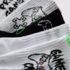 Conjunto de 5 pares de meias curtas com padrões de jogos