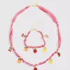 Conjunto de joias com pingentes de frutas